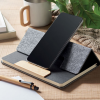 a black tablet on a desk