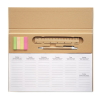 a calendar with pen and post it