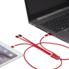 a laptop with a red cord connected to it