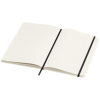 a white notebook with black pencil