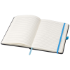 a white notebook with blue band