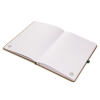 a white book with a green marker