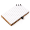 a white notepad with black pins