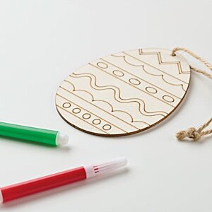 Additional Image 3 - a wooden egg shaped object with a red and green pen