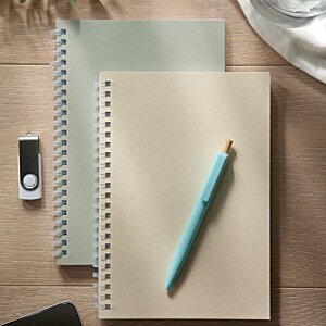 Additional Image 1 - a notebooks and pen on a table