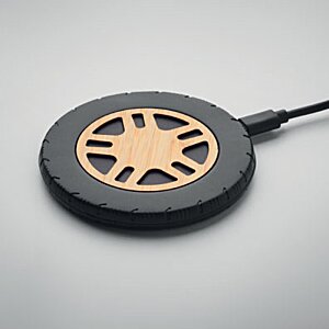 Additional Image 1 - a black and orange device with a wire