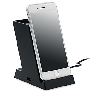 Additional Image 3 - a phone charging on a charging stand