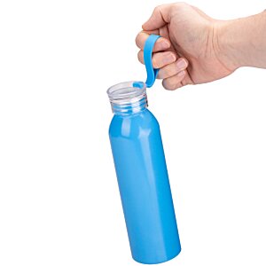 Additional Image 1 - a hand holding a blue bottle