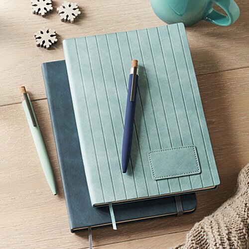 Additional Image 2 - a blue notebooks and a pen on a table
