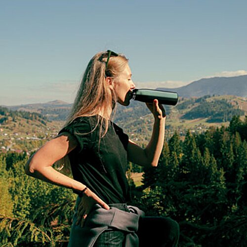 Additional Image 8 - a woman with long hair holding a microphone