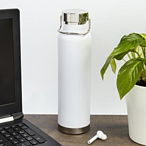 Additional Image 1 - a white bottle on a table