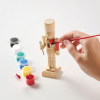 Additional Thumbnail Image 1 - a hand holding a paintbrush to a wooden figure
