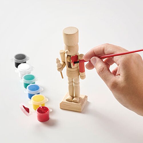 Additional Image 1 - a hand holding a paintbrush to a wooden figure