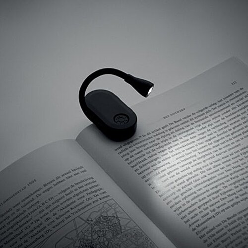 Additional Image 4 - a black headphone on a book