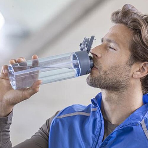 Additional Image 8 - a man drinking from a plastic bottle