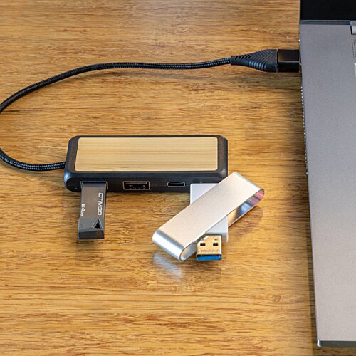 Additional Image 1 - a usb flash drive next to a laptop