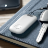 Additional Thumbnail Image 1 - a white device on a book