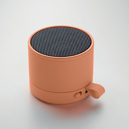 Additional Image 1 - a round orange object with a black circle