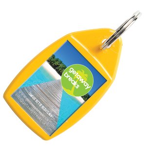 Additional Image 5 - a yellow tag with a blue and green label