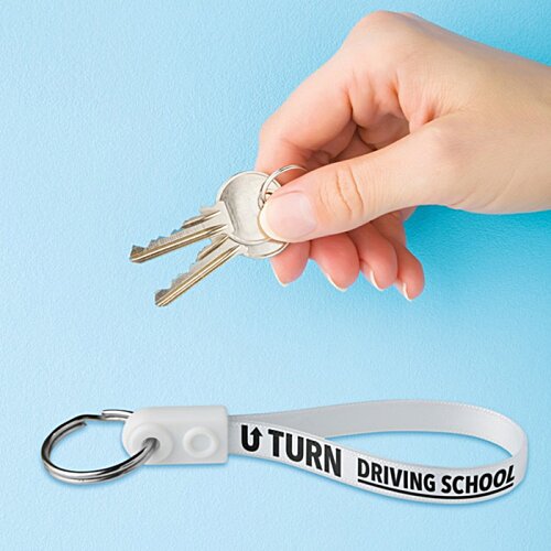 Additional Image 3 - a hand holding a key chain