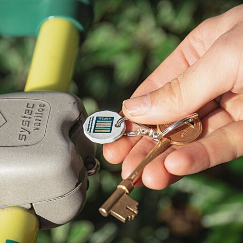 Additional Image 1 - a hand holding a key