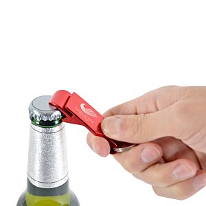 Additional Image 2 - a hand opening a bottle of wine
