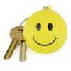 a yellow smiley face key chain with keys