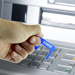 Additional Image 2 - a hand holding a key to a keypad