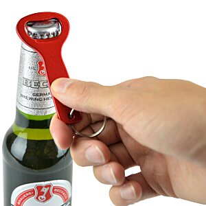 Additional Image 1 - a hand holding a bottle opener