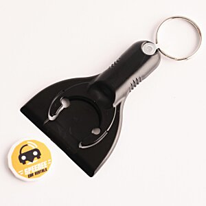 Additional Image 3 - a black bottle opener and a yellow coin