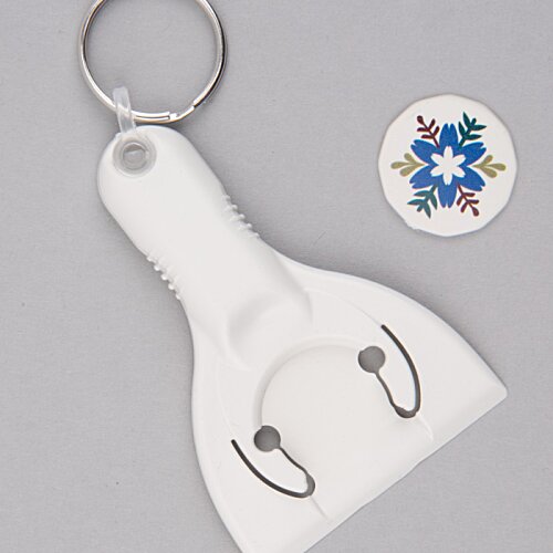 Additional Image 11 - a white plastic object with a silver ring and a blue star