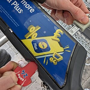 Additional Image 8 - a person holding a blue and yellow label