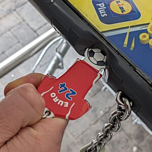 Additional Image 9 - a hand holding a red keychain