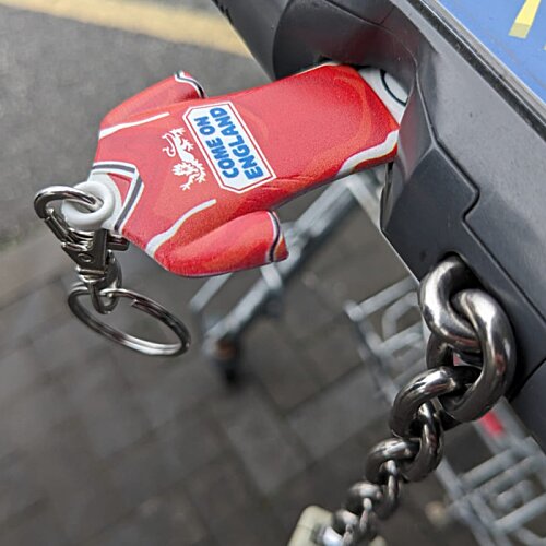 Additional Image 10 - a red object on a chain