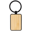 a wooden key chain with a black ring