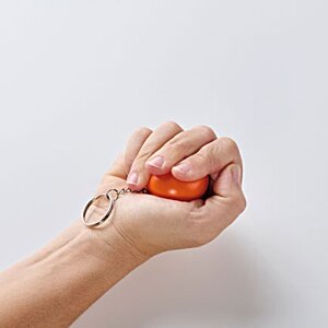 Additional Image 1 - a hand holding a red object