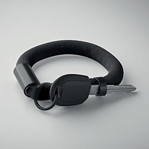 Additional Image 2 - a black headphones on a white surface