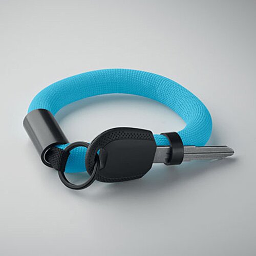 Additional Image 3 - a blue and black ring with a key