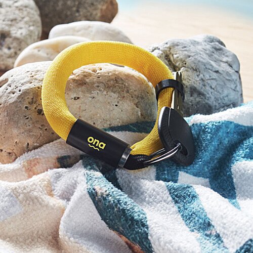 Additional Image 5 - a yellow bracelet on a towel