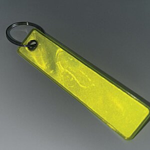 Additional Image 1 - a yellow rectangular object with a ring