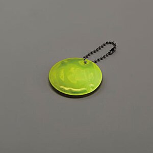 Additional Image 1 - a yellow round object with a black string