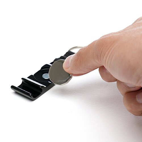 Additional Image 9 - a hand holding a small black device