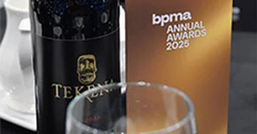 Wine bottle and brochure.