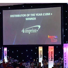 Stage and projector screen.