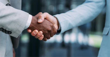 two people shaking hands