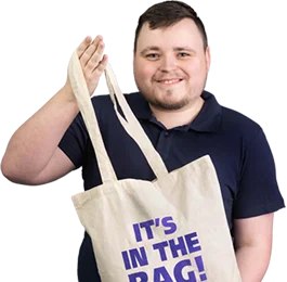 4imprint employee Joe holding the 4imprint Cotton Tote