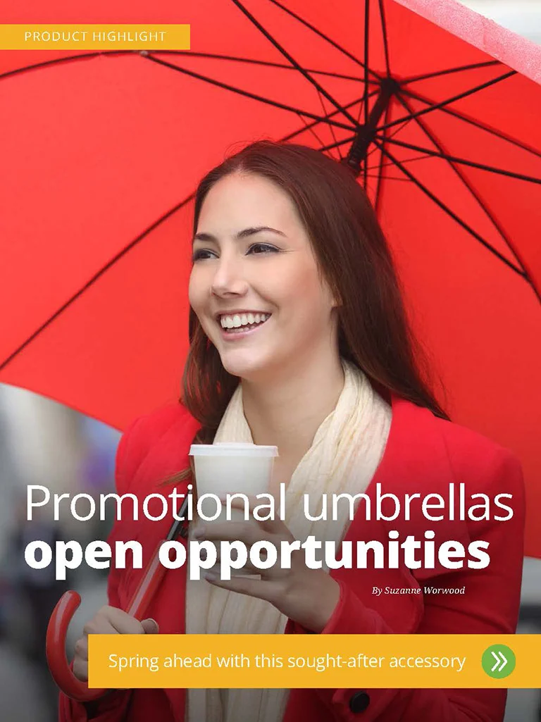Woman under and umbrella while holding a coffee